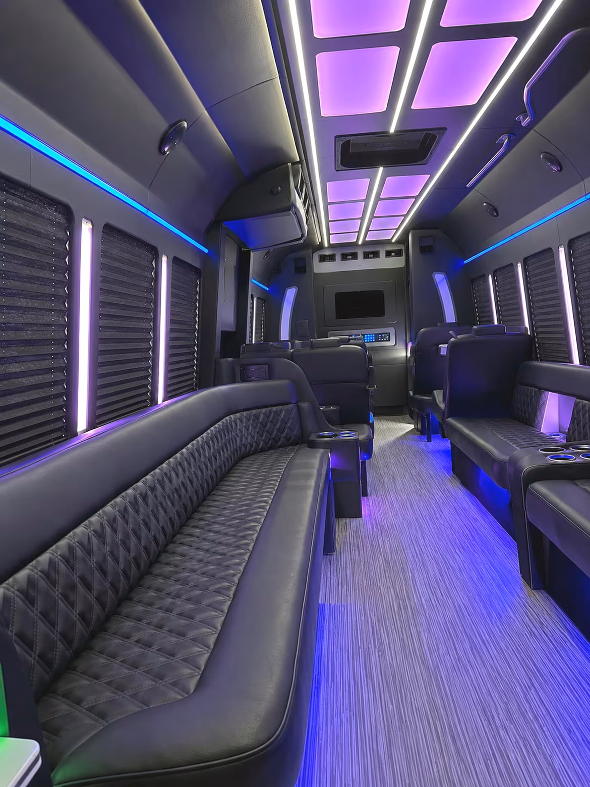 Wedding guests seated inside a party bus serving Jacksonville